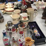 A QUANTITY OF BREWERY RELATED ITEMS TO INCLUDE WATER JUGS, MUGS, THEMED DIET COKE BOTTLES, A BOXED