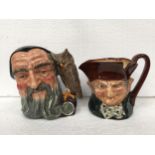 A PAIR OF VINTAGE ROYAL DOULTON CHARACTER JUG'S - "OLD CHARLIE" AND "MERLIN" - BASE TO TOP OF HANDLE