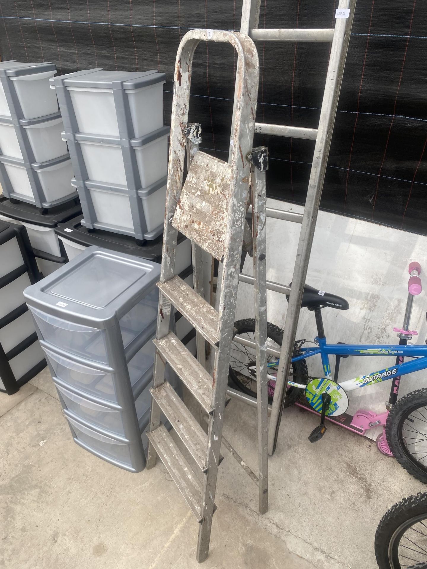 AN 11 RUNG ALUMINUM STEP LADDER AND A FOUR RUNG ALUMINIUM STEP LADDER - Image 2 of 4