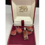 A SILVER NECKLACE AND TWO PAIRS OF EARRINGS ALL WITH PINK COLOURED STONES IN A PRESENTATION BOX