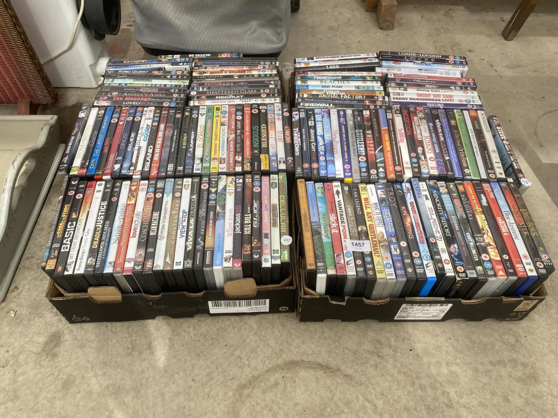 A LARGE ASSORTMENT OF DVDS