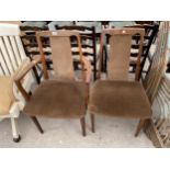 A RETRO TEAK G-PLAN CARVER CHAIR AND DINING CHAIR IN VAN DYCK BROWN