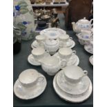A QUANTITY OF WEDGWOOD 'BELLE FLEUR' CHINA TO INCLUDE TRIOS, PLATES, CREAM JUG AND SUGAR BOWL