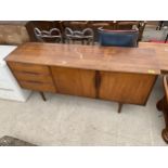 A RETRO TEAK SIDEBOARD ENCLOSING THREE DRAWERS AND TWO CUPBOARDS, 66" WIDE