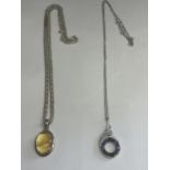 TWO SILVER NECKLACES WITH PENDANTS