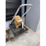 A ROBIN PETROL WACKER PLATE AND A FOUR WHEEL TROLLEY BELIEVED IN GOOD WORKING ORDER BUT NO WARRANTY