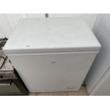 A WHITE LOGIK CHEST FREEZER