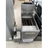 A STAINLESS STEEL KITCHEN FRYER AND A STAINLESS STEEL FOOD SLICING PROCESSOR