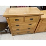A MODERN OAK CHEST OF TWO SHORT AND THREE LONG DRAWERS, 37" WIDE