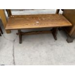 AN OAK 'WEBBER FURNITURE' COFFEE TABLE