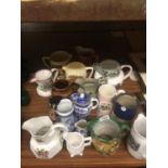 A COLLECTION OF VINTAGE JUGS TO INCLUDE BOVEY POTTERY TRANSFER PRINTED PIECES, GIBSONS, RINGTONS