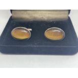A BOXED SET OF SILVER TIGER'S EYE CUFF LINKS