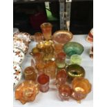 A QUANTITY OF AMBER COLOURED GLASSWARE TO INCLUDE CARNIVAL GLASS JUGS, VASES, BOWLS, ETC