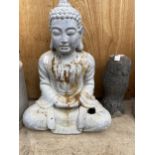 A RECONSTITUTED STONE OWL FIGURE AND A FIBRE GLASS BUDDHA (A/F)