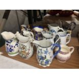 A LARGE QUANTITY OF CERAMIC JUGS TO WOODSWARE, WEDGWOOD, ROYAL WINTON, BURLEIGH WARE ETC.,