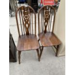 A PAIR OF WHEELBACK KITCHEN CHAIRS