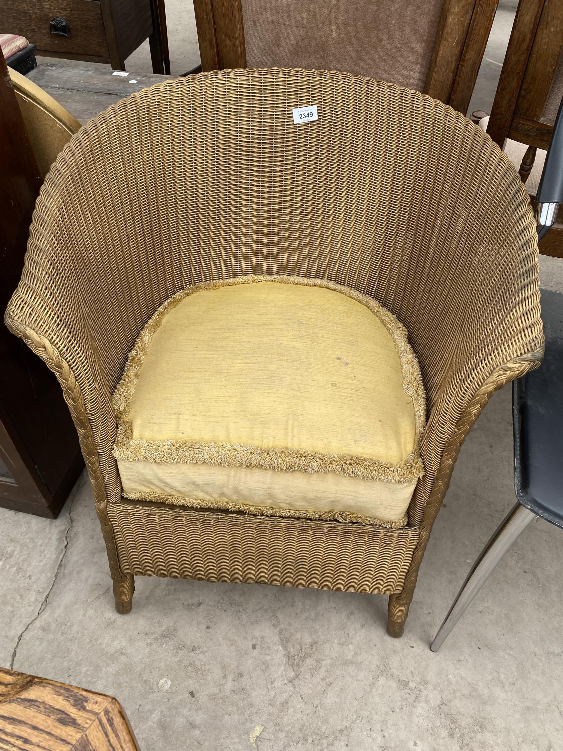 A LLOYD LOOM BEDROOM CHAIR