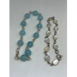 TWO MARKED SILVER BRACELETS ONE WITH BLUE STONES AND ONE WITH PEARLISED