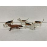 A BESWICK FOX TOGETHER WITH FOUR FOX HOUNDS