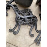 A PAIR OF DECORATIVE CAST IRON BENCH ENDS WITH LION HEAD HANDLES