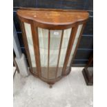 A MID 20TH CENTURY SHINY WALNUT BOWFRONTED DISPLAY CABINET