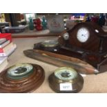 TWO VINTAGE WOODEN CASED MANTLE CLOCKS, THREE BAROMETERS - TWO WITH CRACKED GLASS AND A SHUTTLE