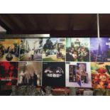 A LARGE CANVAS OF OASIS ALBUM COVERS - 122 X 51 CM