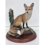 A BORDER FINE ARTS FIGURE OF A FOX "SITTING SAFE" - A2027 - TINY NIBBLE TO RIGHT EAR