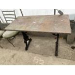 A CAST IRON PUB TABLE WITH BEATEN COPPER TOP, 42X20"