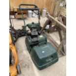 AN ATCO BALMORAL 14SE PETROL LAWNMOWER COMPLETE WITH GRASS BOX