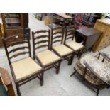 A REPRODUCTION OAK GATELEG DINING TABLE AND FOUR CHAIRS