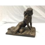 A BRONZED CERAMIC FIGURE OF A NUDE LADY ON A BASE SIGNED AWLSON 32/50 H: 34CM