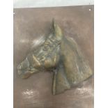A HEAVY BRONZE AND BRASS PLAQUE OF RED RUM 20CM X 25CM