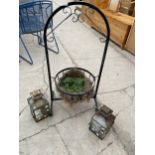A DECORATIVE METAL PLANTER AND TWO LANTERN CANDLE HOLDERS