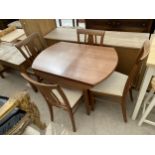 A MODERN H.J.BERRY DROP-LEAF DINING TABLE AND FOUR CHAIRS