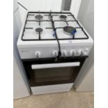 A WHITE AND BLACK WILLOW ELECTRIC AND GAS OVEN AND HOB