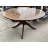 A MAHOGANY AND CROSSBANDED REGENCY STYLE EXTENDING TABLE, 48" DIAMETER (LEAF 15")