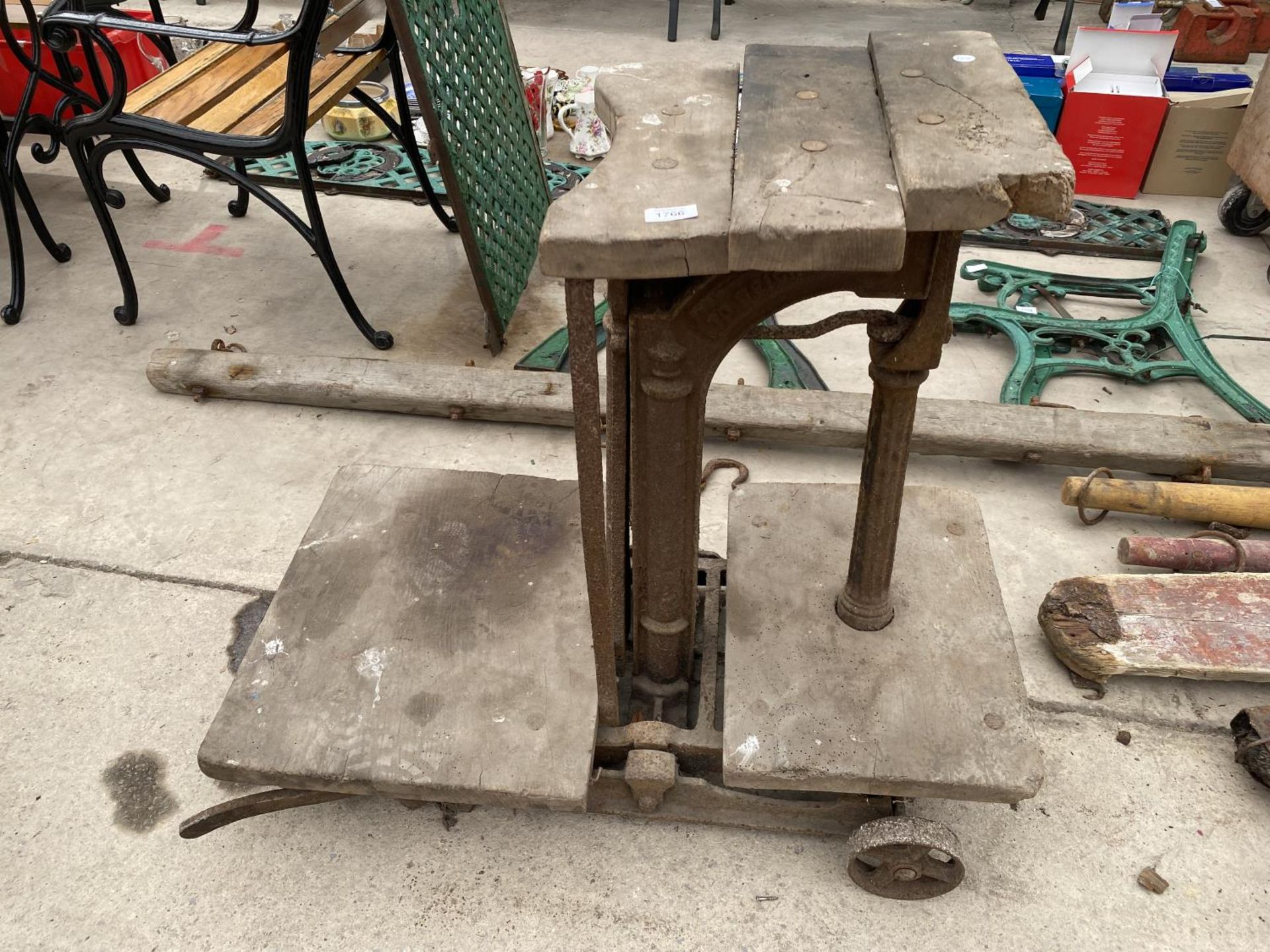 A SET OF VINTAGE WOODEN AND METAL POTATO SCALES