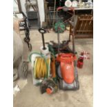 AN ASSORTMENT OF GARDEN ITEMS TO INCLUDE A FLYMO LAWN MOWER AND AN ELECTRIC STRIMMER ETC