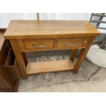 A MODERN OAK TWO DRAWER SIDE TABLE WITH TWO DRAWERS, 35.5" WIDE