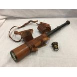 A VINTAGE BRASS AND LEATHER TELESCOPE RECONDITIONED FOR JOHN BARKER & CO LTD KENSINGTON W.8. BY