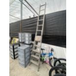 AN 11 RUNG ALUMINUM STEP LADDER AND A FOUR RUNG ALUMINIUM STEP LADDER