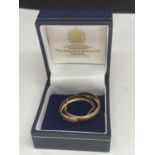 A PAIR OF 9 CARAT GOLD HOOP EARRINGS IN A PRESENTATION BOX