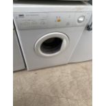 A WHITE ZANUSSI DUAL TEMPERATURE TUMBLE DRYER