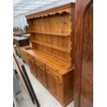 A MODERN PINE DRESSER COMPLETE WITH RACK, 72" WIDE