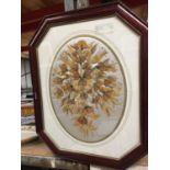 A 'LEAF' PICTURE ON CUSHIONED BACKGROUND IN AN OCTAGONAL FRAME