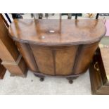 A MID 20TH CENTURY BURR WALNUT BOWFRONTED TWO DOOR CABINET