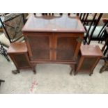 A VAN DE MOLEN WALNUT AND CROSSBANDED STEREO CABINET ON CABRIOLE LEGS WITH TWO SPEAKERS AND