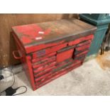 A RED METAL MULTI DRAWER TOOL CHEST