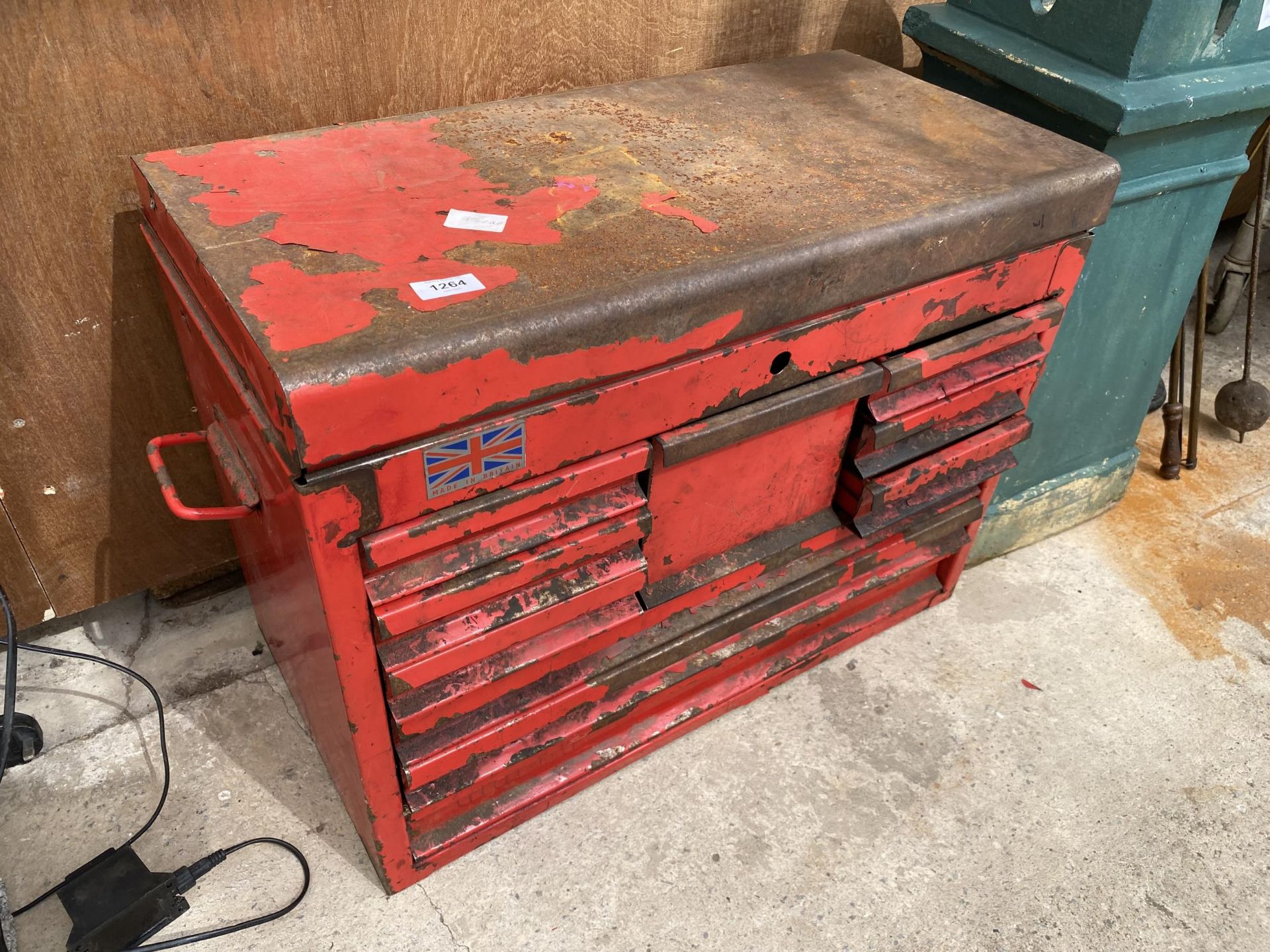 A RED METAL MULTI DRAWER TOOL CHEST